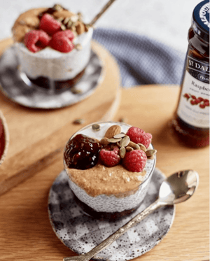Layered chai pudding cup with St. Dalfour's  red raspberry fruit spread